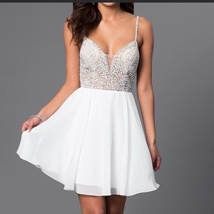 Beautiful Jovani white chiffon beaded dress....